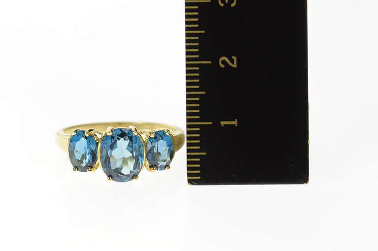 10K Yellow Gold Three Stone London Blue Topaz Statement Ring