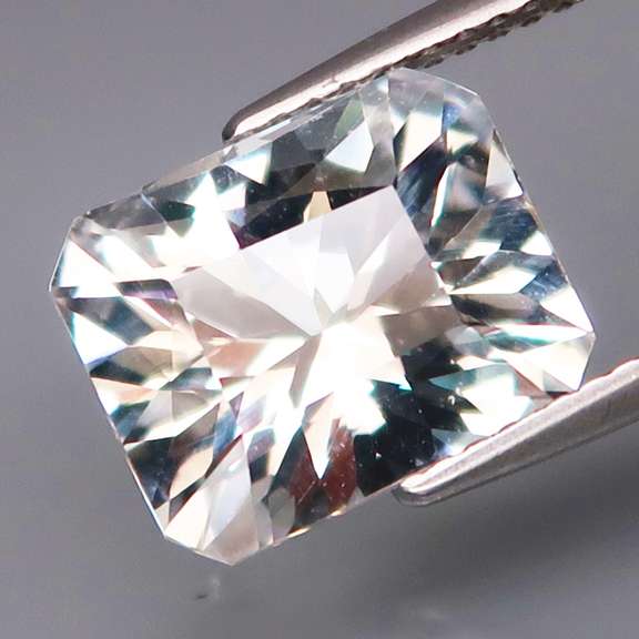 Pristine 5.58ct concave emerald cut diamond white Topaz