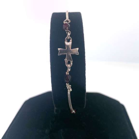 Sterling silver bracelet with silver cross charm and red beads