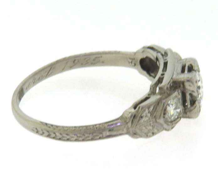 Charming Platinum Diamond Engagement Ring