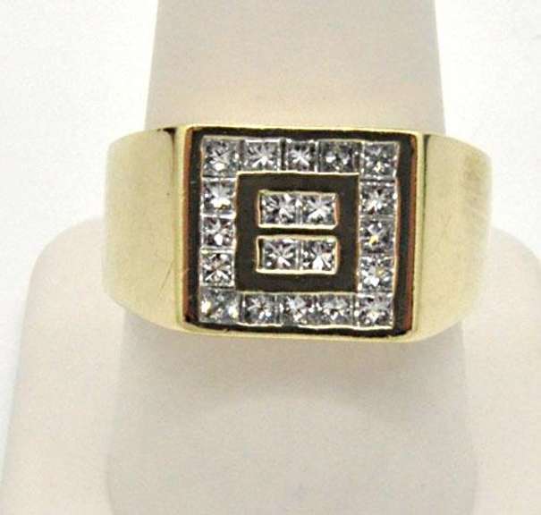 MEN'S 14KT GOLD AND DIAMOND RING.