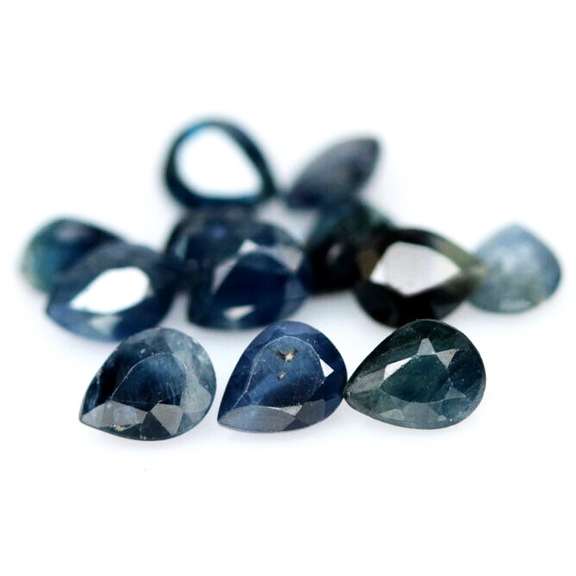 Captivating royal blue 4.68ct Sapphire set