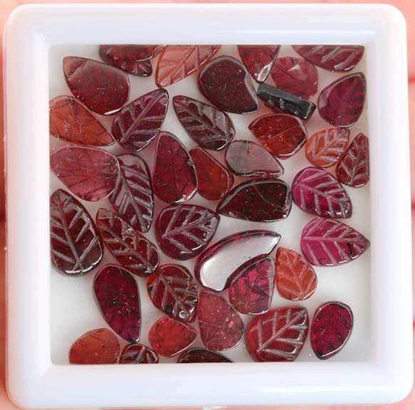 Fantastic 56.5ct collection of leaf cut Garnets