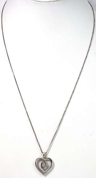 Charming Diamond Heart Pendant in Sterling Silver