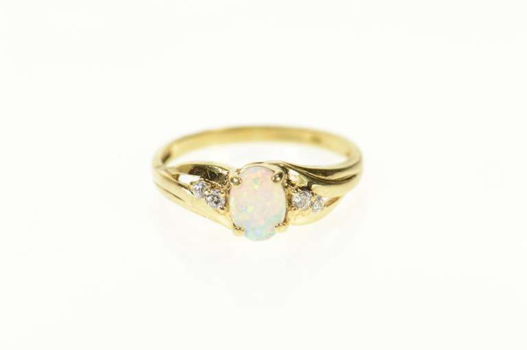 10K Yellow Gold Classic Syn. Opal CZ Accent Bypass Ring