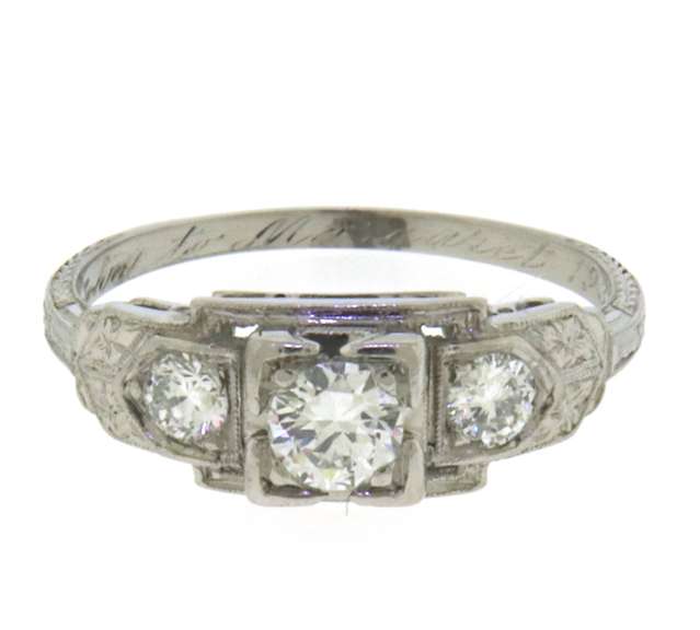 Charming Platinum Diamond Engagement Ring