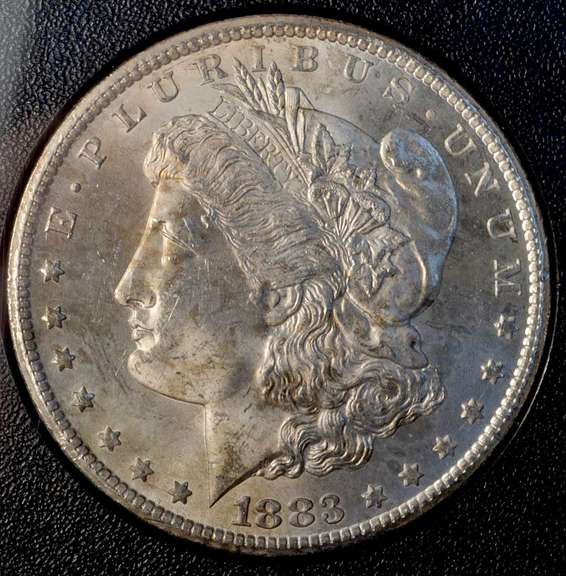 1883-CC GSA Hoard Uncirculated Morgan Silver Dollar.