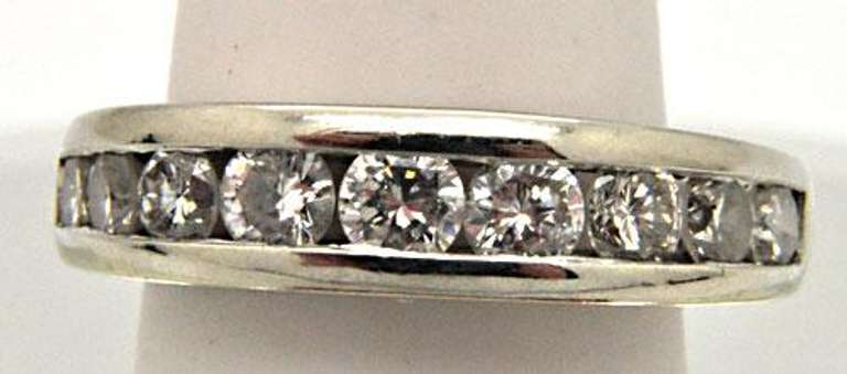 18KT WHITE GOLD DIAMOND BAND.