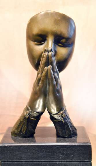 Face with Praying Hands