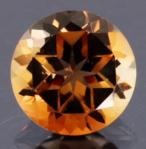 Rich red amber 2.20ct Imperial Topaz solitaire