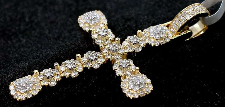 Beautiful Diamond Cross Pendant in Gold