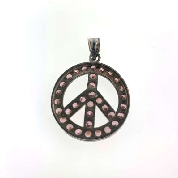 Sterling silver peace pendant with pink gemstones