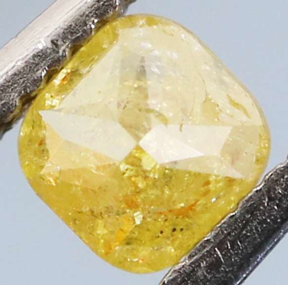 Rare .21ct emerald cut canary yellow Diamond