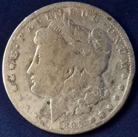 1895-O Morgan Silver Dollar. Well Circulated. Key Date.