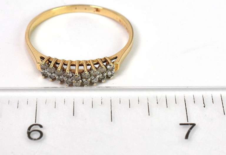 Glistening 0.14CTW Diamond Ring in Yellow Gold