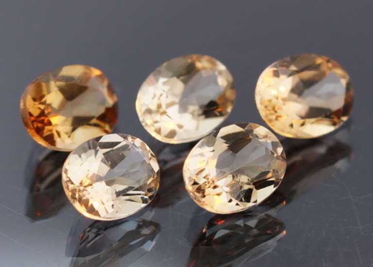 Sparkling 7.47ct peach champagne Topaz set