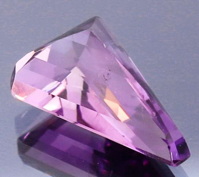 Outstanding 10.54ct custom trillion cut Amethyst