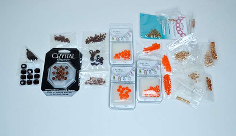 Assorted Lot of Swarovski Crystal Beads in Smoke and Topaz Tones