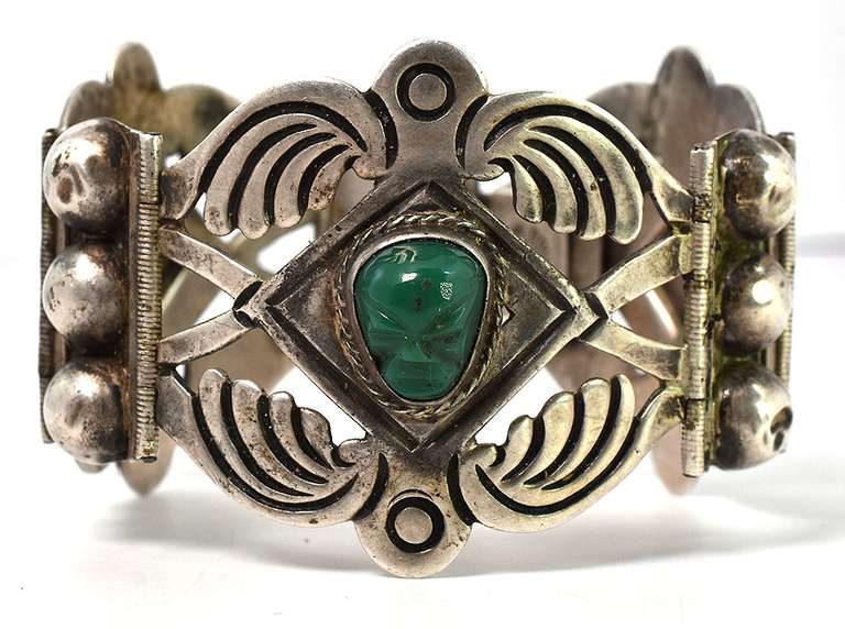 Eye-Catching Carved Green Stone Bangle in Sterling Silver