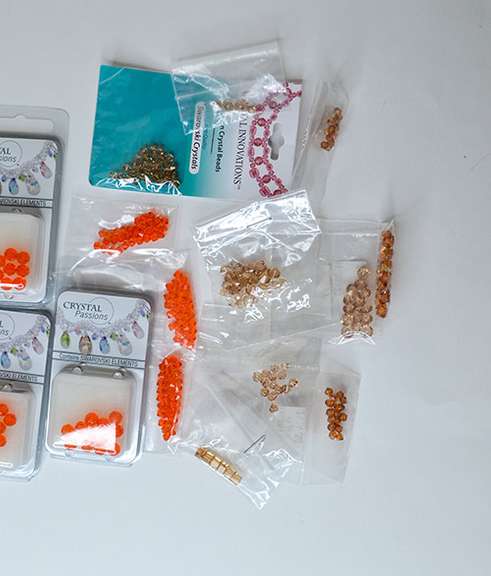 Assorted Lot of Swarovski Crystal Beads in Smoke and Topaz Tones