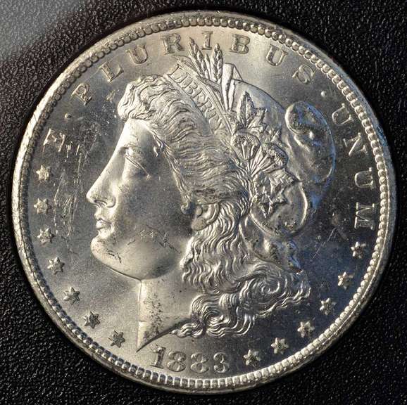 1883-CC GSA Hoard Uncirculated Morgan Silver Dollar.