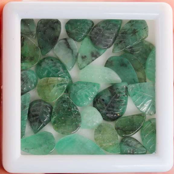 Fantastic 45.5ct collection of leaf cut Emeralds