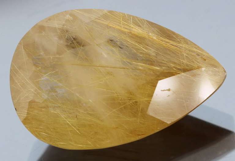 Fully faceted 23.95ct golden rutile Quartz