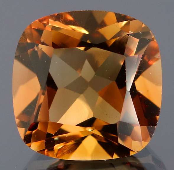 Glittering 6.93ct cushion cut Imperial Topaz
