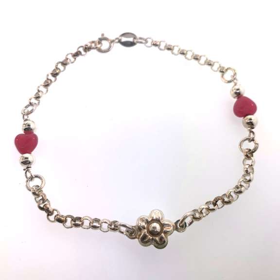 Sterling silver bracelet with pink heart beads and a flower charm