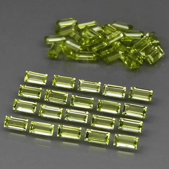 Dazzling 6.20ct untreated apple green Peridot set