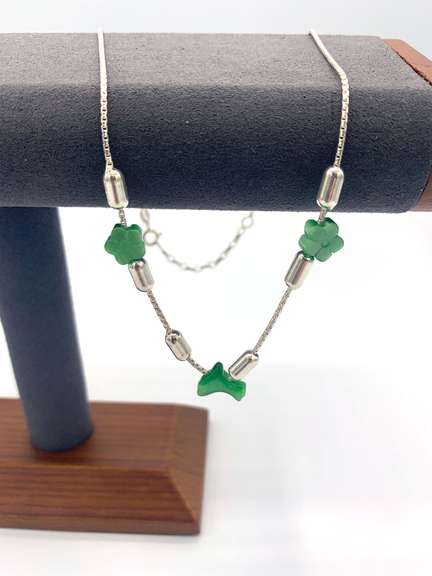 Sterling silver necklace with green dolphin and flower charms and silver beads