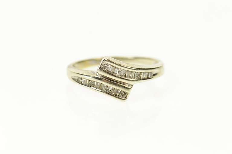 10K White Gold Round & Baguette Diamond Bypass Ring
