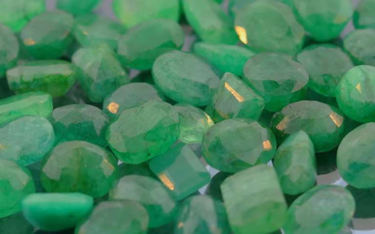 Heavy 301ct collection of Emeralds
