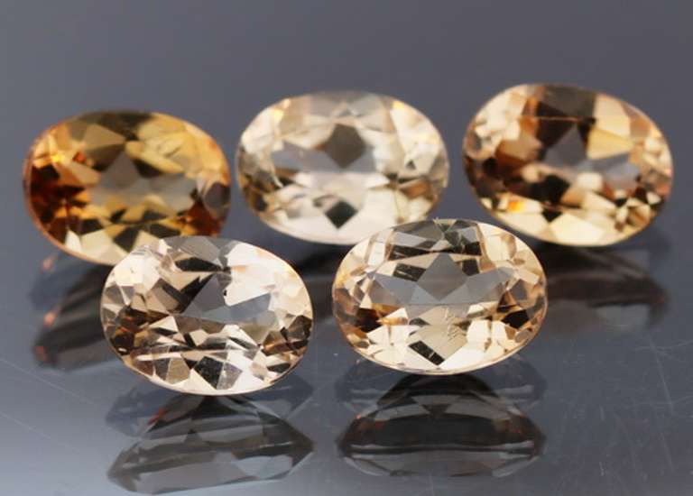 Sparkling 7.47ct peach champagne Topaz set