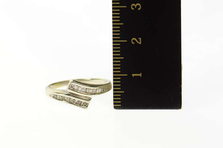10K White Gold Round & Baguette Diamond Bypass Ring