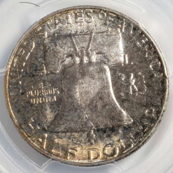 Toned 1957 PCGS MS 65 + Franklin Half Dollar