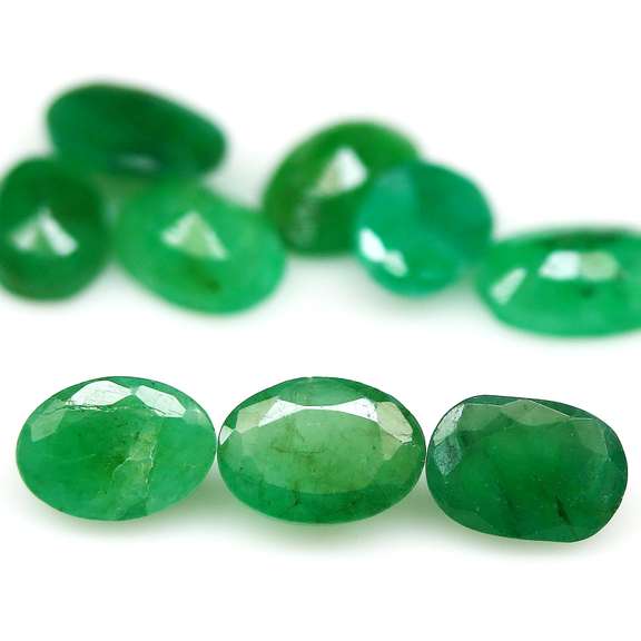 Deep green 9 piece 6.68ct Zambian emerald set