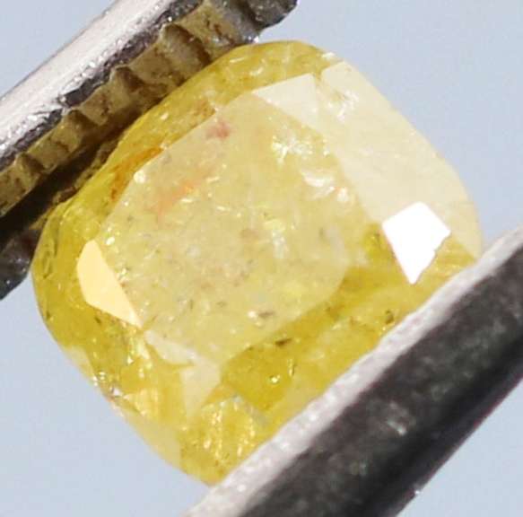 Rare .21ct emerald cut canary yellow Diamond