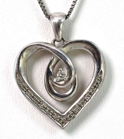 Charming Diamond Heart Pendant in Sterling Silver