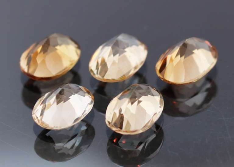 Sparkling 7.47ct peach champagne Topaz set