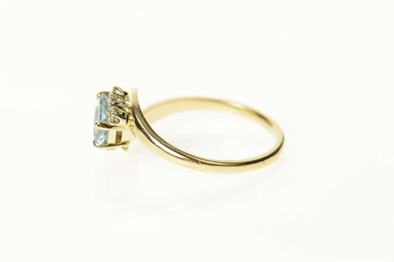 14K Yellow Gold Emerald Sim. Aquamarine CZ Bypass Ring