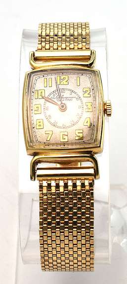 Vintage Jules Juergensen 14 K Gold Watch with 14 K Gold Band.