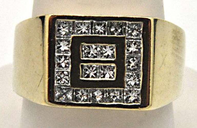MEN'S 14KT GOLD AND DIAMOND RING.