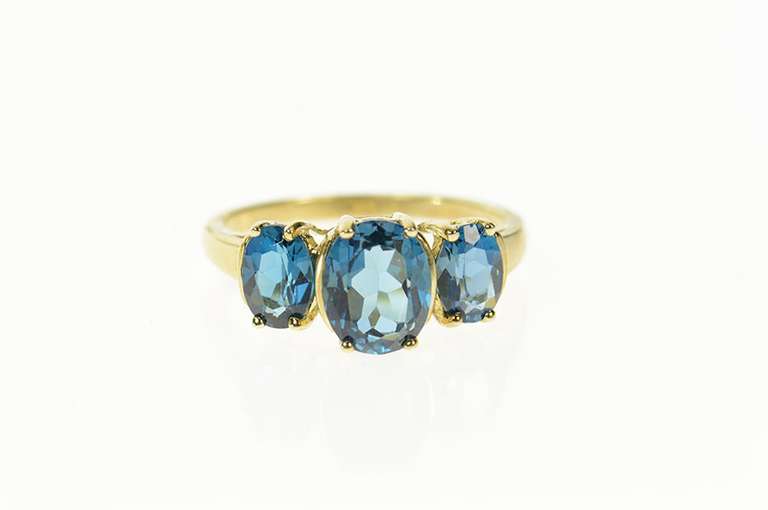 10K Yellow Gold Three Stone London Blue Topaz Statement Ring