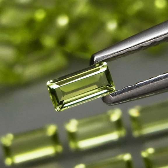 Dazzling 6.20ct untreated apple green Peridot set