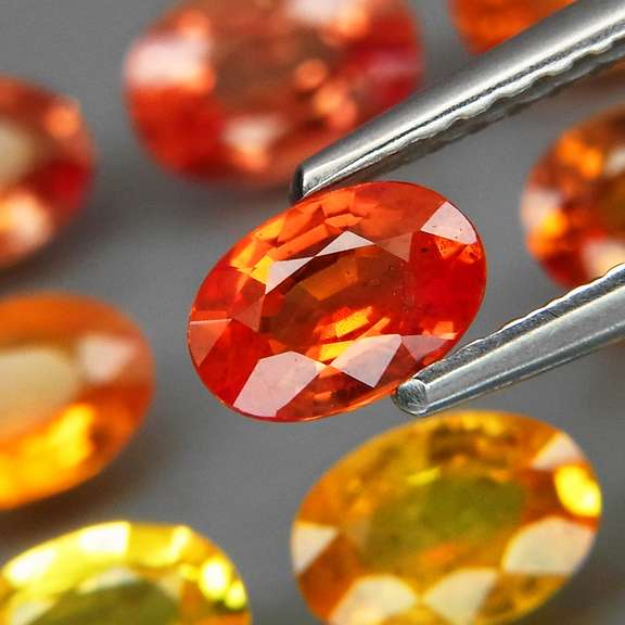 Glittering 9 piece 4.30ct fancy color Sapphire set