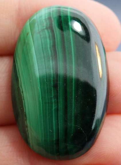 Phenomenal 66.65ct banded Malachite cabochon