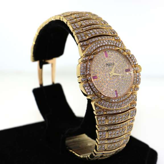 Very Rare and Collectable18kt Yellow Gold Diamond and Ruby Piaget Tanagra Watch