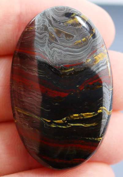 Dramatic 79.19ct Tiger Eye cabochon