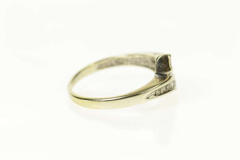 10K White Gold Round & Baguette Diamond Bypass Ring
